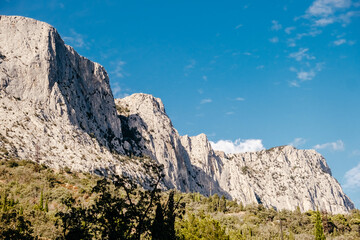 Fototapeta na wymiar a beautiful rock against the blue sky. mountain landscape. space for text