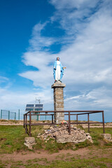 summit of the mountain petit Ballon in the Alsace region of France with statue of holy Mary