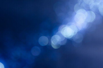 abstract blue bokeh glitter sparkle background.