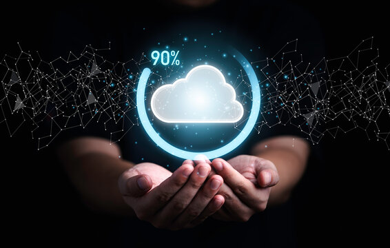 Businessman holding virtual cloud computing with download percentage progress for transfer data information upload download application. Technology transformation concept.