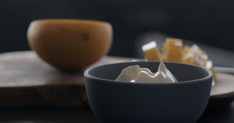 put natural organic yogurt in blue bowl