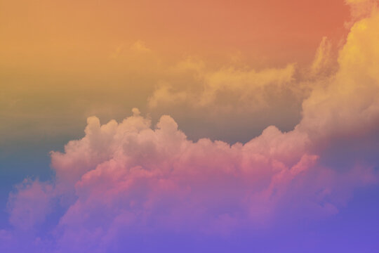 beauty sweet pastel orange yellow colorful with fluffy clouds on sky. multi color rainbow image. abstract fantasy growing light