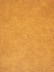 Suede surface in beige and mustard color as a background. High quality photo