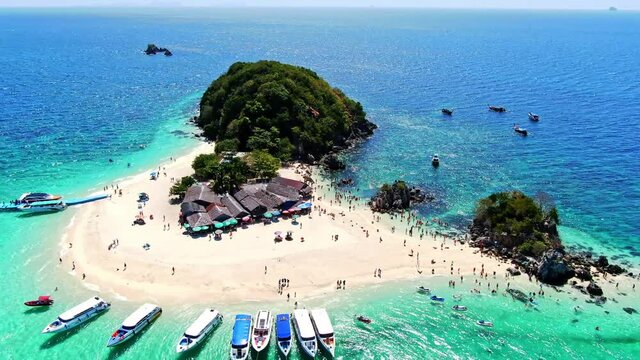 4K Shooting With Drone. Koh Khai Nai island, Phuket, Thailand. Beautiful tropical island with white sand beach and turquoise clear water.