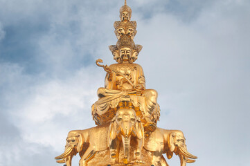 Fototapeta na wymiar gold statue of Samantabhadra Bodhisattva mount emei