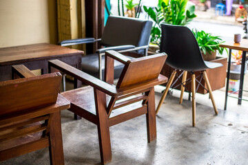 The background of modern design chairs is reflected on the cement floor, placed for viewing the scenery on the building or various attractions.