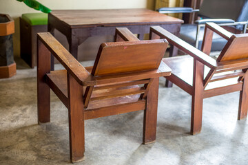 The background of modern design chairs is reflected on the cement floor, placed for viewing the scenery on the building or various attractions.