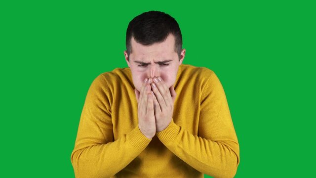 sick man coughing on green screen