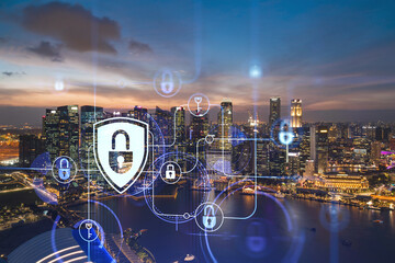 Glowing padlock hologram, night panoramic city view of Singapore, Asia. The concept of cyber security to protect companies. Double exposure.