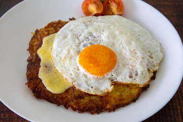Berner Senne Roesti, Swiss potato cake with Appenzeller cheese topped with a fried egg