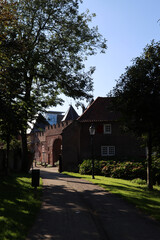 Medieval gate in the Dutch city of Amersfoort. Classic architecture of the Netherlands. Autumn day photo. Beautiful rural building close up photo. 