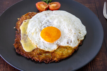 Berner Senne Roesti, Swiss potato cake with Appenzeller cheese topped with a fried egg