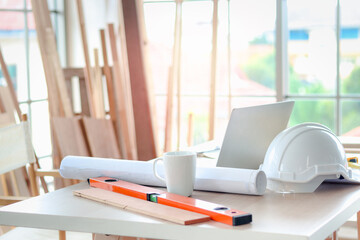 Carpenter working desk with different craft wood tools on wooden table, carpentry woodwork workshop for craftsman enjoys his DIY hobby.