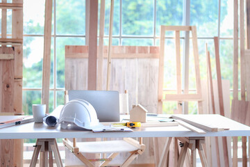 Carpenter working desk with different craft wood tools on wooden table, carpentry woodwork workshop for craftsman enjoys his DIY hobby.
