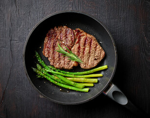 Grilled entrecote on cooking pan, from above