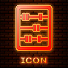 Obraz premium Glowing neon Abacus icon isolated on brick wall background. Traditional counting frame. Education sign. Mathematics school. Vector
