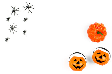 Halloween party. Decorations for halloween on a white background, copy space. Pumpkins and spiders...