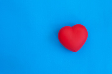 red heart on blue background