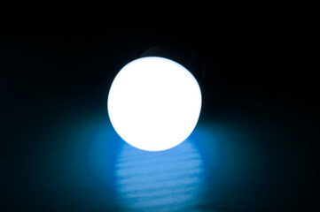 light bulb on the desk. lighting concept. yellow source	