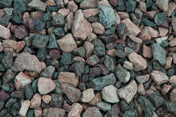 stone background. creative gray texture. colored mosaic. wall made of slabs.	