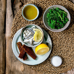 Bowl of pickled anchovies or sardines fillet in oil