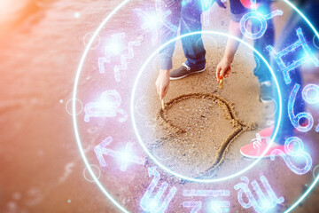Horoscope concept, couple guy and girl on the background of a circle with the signs of the zodiac, astrology. Conceptual photo of a couple with perfect match between the signs of the zodiac.