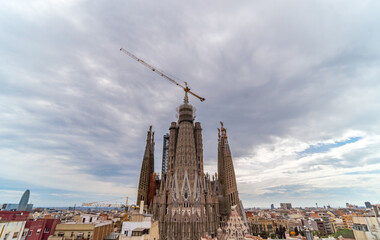 Wide Angle View of the Sagrada Familia Church with Downtown Barcelona in the background