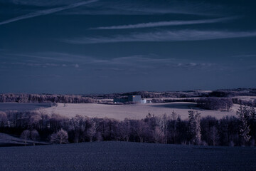 infrared photography - surreal ir photo of landscape with trees under cloudy sky - the art of our...