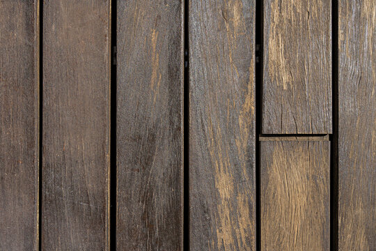Acacia planks in need of a new coat of varnish. Vector wood texture background