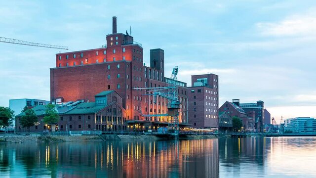 DUISBURG, GERMANY - September 28th 2021: Art Museum Kueppersmuehle in Inner harbor in Duisburg. Museum Kueppersmuehle renewed by Herzog + de Meuron Architects