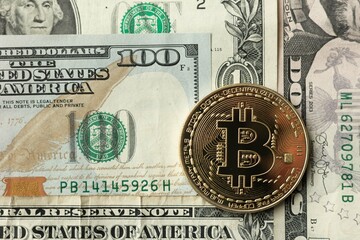 Bitcoin on the background of US dollars