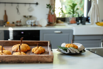 desk with pumpkin cookies at kitchen