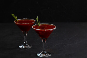 Bloody Mary cocktail. Alcoholic drink with vodka and tomato juice in a glass isolated on a black background. vampiro cocktail with pepper on table. copy space.