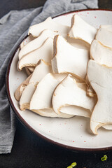 eryngii slice Oyster mushroom King mushrooms Eringi fresh meal snack on the table copy space food background rustic. top view keto or paleo diet veggie vegan or vegetarian food