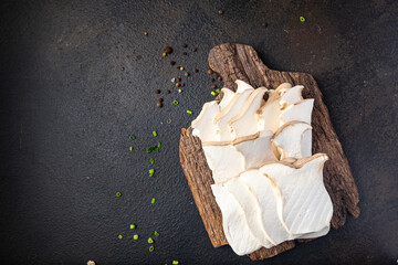 eryngii slice Oyster mushroom King mushrooms Eringi fresh meal snack on the table copy space food background rustic. top view keto or paleo diet veggie vegan or vegetarian food