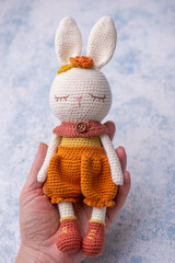 Handmade crocheted bunny, amigurumi toy.