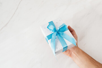 christmas decoration with gift box and blue bows