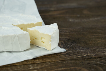fresh cheese on a wooden background