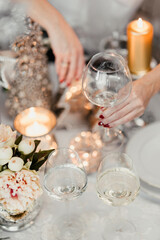 White flowers on a table with porcelain tableware