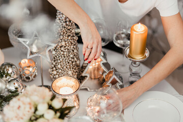 White flowers on a table with porcelain tableware