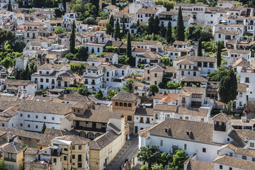 Beautiful aerial view city of Granada in a daytime. Granada - capital city of province of Granada, located at foot of Sierra Nevada Mountains. Granada, Andalusia, Spain.
