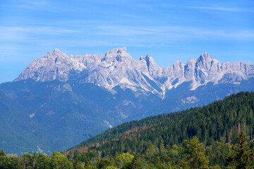 Fototapeta na wymiar Summer view of the famous Pale di San Martino near San Martino di Castrozza, Italian dolomites