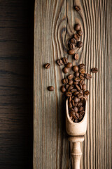 scattered coffee on a wooden background with a wooden floor. High quality photo