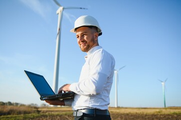 Power engineer are working with wind turbines.