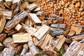 Wood chop stove. Woodpile texture background. Trees store. Hardwood pile stack. Wooden biomass wall. Split forest. Agriculture work