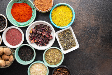 mix spices seasoning different types pungent and spicy fresh herbs, ground spice on the table copy space food background rustic 
