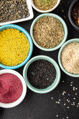 mix spices seasoning different types pungent and spicy fresh herbs, ground spice on the table copy space food background rustic 