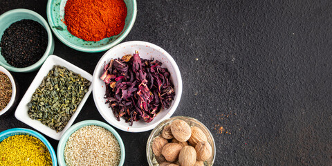 mix spices seasoning different types pungent and spicy fresh herbs, ground spice on the table copy space food background rustic 