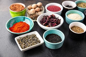 mix spices seasoning different types pungent and spicy fresh herbs, ground spice on the table copy space food background rustic 