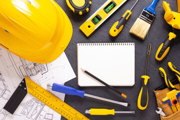 Construction tools at black background. Tool for house renovation
